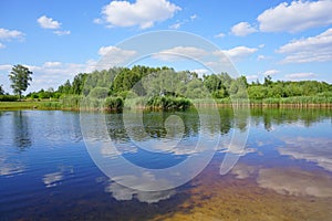 Wild swimming pool, small lake - beautiful spring day- green space around the city