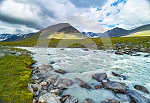 A wild, turbulent mountain river in the Sarek National Park, Sweden.