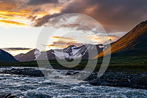 A wild, turbulent mountain river in the Sarek National Park, Sweden.