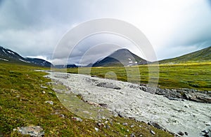 A wild, turbulent mountain river in the Sarek National Park, Sweden.