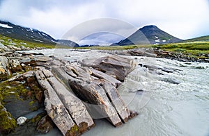 A wild, turbulent mountain river in the Sarek National Park, Sweden.