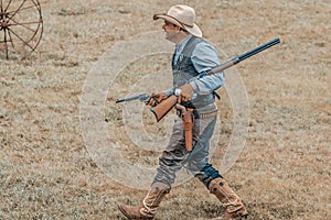 Wild west Cowboy with guns and leather holsters