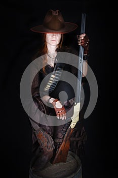 Wild west girl with rifle