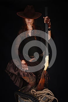 Wild west girl with rifle