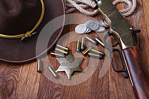 Wild west gun, ammunition and U.S. Marshal Badge