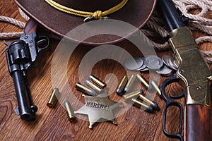 Wild west gun, ammunition and U.S. Marshal Badge