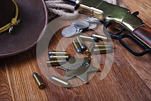 Wild west gun, ammunition and U.S. Marshal Badge