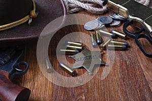 Wild west gun, ammunition and U.S. Marshal Badge