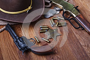 Wild west gun, ammunition and U.S. Marshal Badge