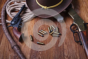 Wild west guns, ammunition and silver dollars