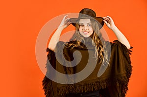 Wild west. Western child. Western soul. Cowboy hat adorable girl. American outfit. Rancho culture. Western traditions