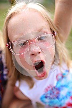 Wild Young Girl Having Fun on Summer Day