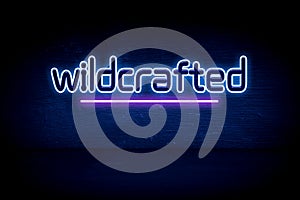 wildcrafted - blue neon announcement signboard