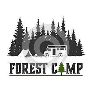 Wilderness Explorer logo with camp car and pine trees forest. photo