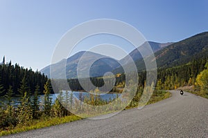 Wilderness View of Motorbike Riding the Remote Cassiar Highway,