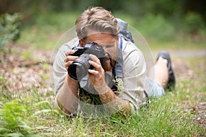 Wildlife photographer outdoor in action