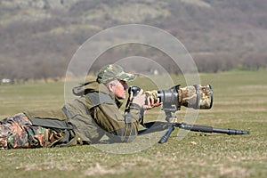 Wildlife photographer outdoor in action