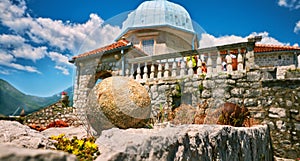 Wildlife on stones of orthodox church Island Gospa od Skrpjela Perast Boka Kotorska Montenegro photo