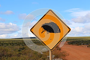 Wildlife trafic warning sign with echidna in the Western Australian outback