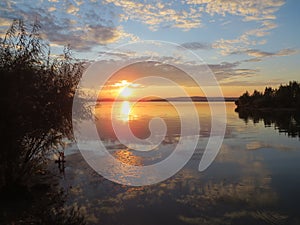 Wildly beautiful yellow-red sunset. Shooting in the nature.