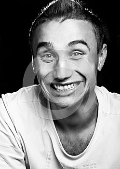 Wildly smiling maniac