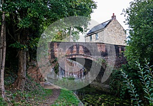 Wildmoorway Lower Lock Bridge and Lock Keepers cottage on the Severn - Thames Canal, Cerney Wick, England UK