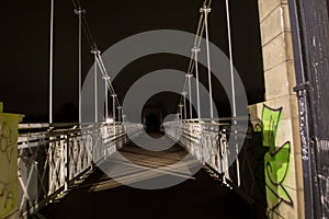 The Wilford Suspension Bridge at night in Nottingham