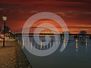 The Wilhelmina bridge near Deventer at sunset photo