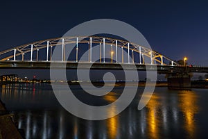 The Wilhelmina bridge at the river IJssel near Deventer in the Netherlands at night