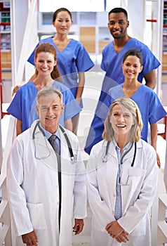 They will give you the best care possible. Portrait of a diverse team of medical professionals standing on a staircase