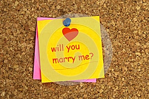 Will you marry me postit on cork