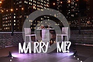 Will you marry me proposal decoration set with sign in the city.