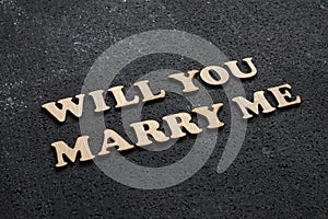 Will you marry me. Romantic couple message words lettering. Mariage proposal words arranged with wooden alphabet