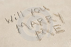Will You Marry Me Written In Sand