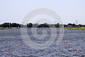 Willem-Alexanderbaan as rowing facility in water storage Eendragtspolder for preventing flood