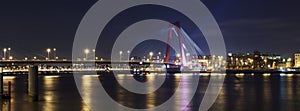 Willemsbrug Bridge and river Meuse at night