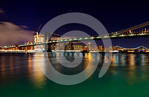 Williamsburg bridge by night, spanning the East River