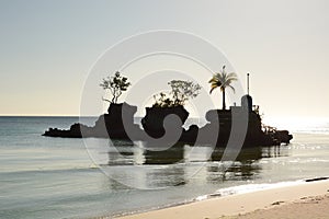 Willys rock silhouette at sunset. White Beach Boracay Island. Aklan. Western Visayas. Philippines