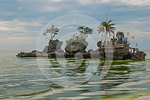 Willys Rock, situated on the famous White Beach, Boracay Island, Philippines