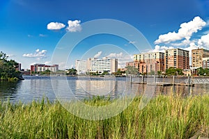Wilmington in North Carolina and rows of houses along the waterfront of the Christiana River