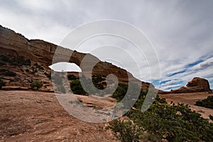 Wilson Arch, located in Dry Valley Utah, is an entrada standstone formation photo