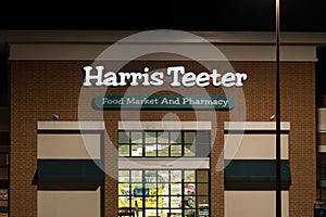 A Harris Teeter grocery store entrance at night