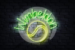 Wimbeldon Neon Sign on a dark wall