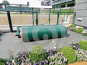 Old roller used on grass courts. All England Lawn Tennis and Croquet Club. Wimbledon, United Kingdom.