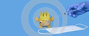Win coronavirus concept. Covid-19 cartoon image, face mask, hand with injector on blue background. Medical banner. Copyspace
