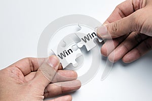 Win win situation on white puzzle photo