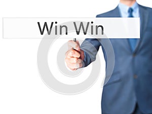 Win Win - Businessman hand holding sign