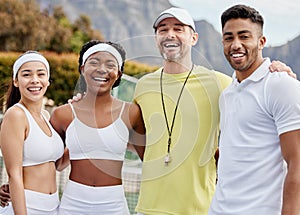 We win when we work together. Cropped portrait of three young tennis players and their coach standing outside on the