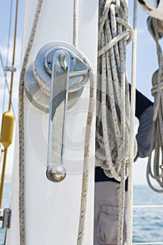 Winch handle and rope on yacht