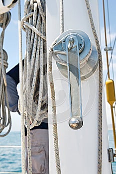 Winch handle and rope on yacht